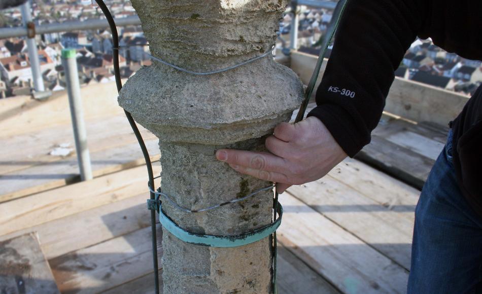 Stone erosion to the spire finial