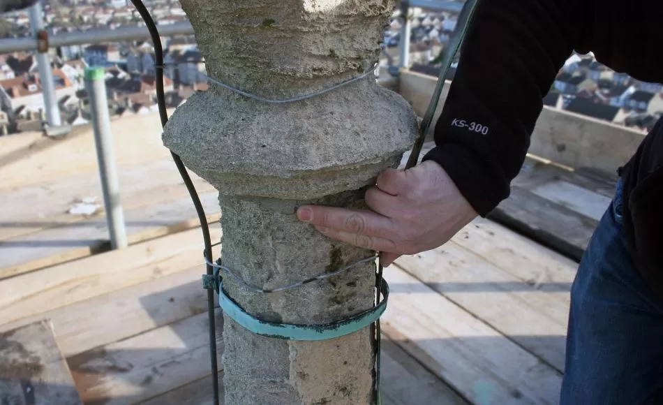 Stone erosion to the spire finial