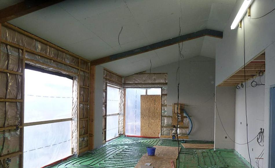 Plasterboarding well under way. Insulation ready to be laid to the floor