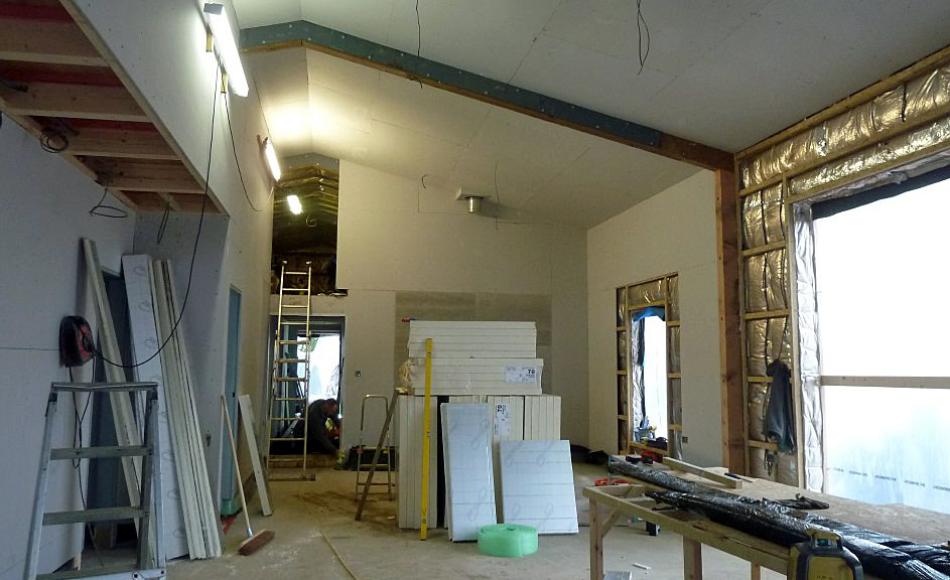 Double height open plan living, dining and kitchen space