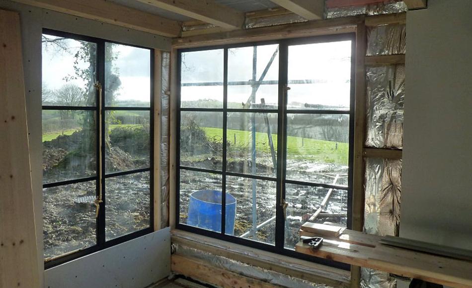 Powder coated steel frame windows by Fabco will provide fantastic views across the valley