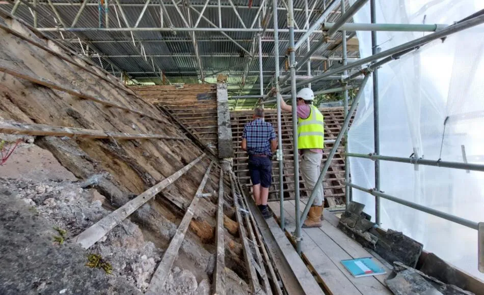 Inspecting the newly exposed medieval timber roof structure
