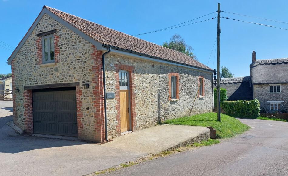 Following conversion. The roof has been replaced with clay tiles. 