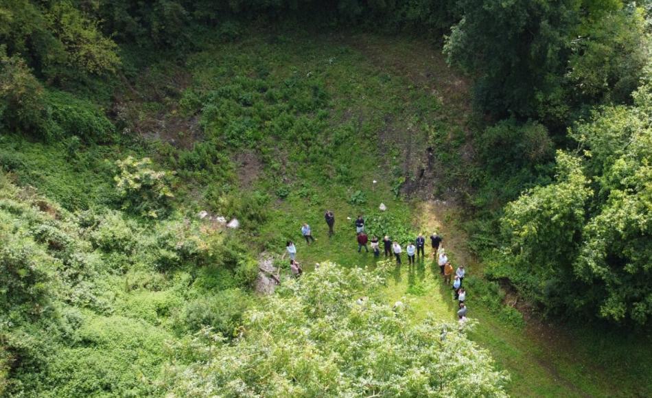The team gathered at the quarry to learn about the sourcing of replacement stone for the Grade I listed Chapel repairs