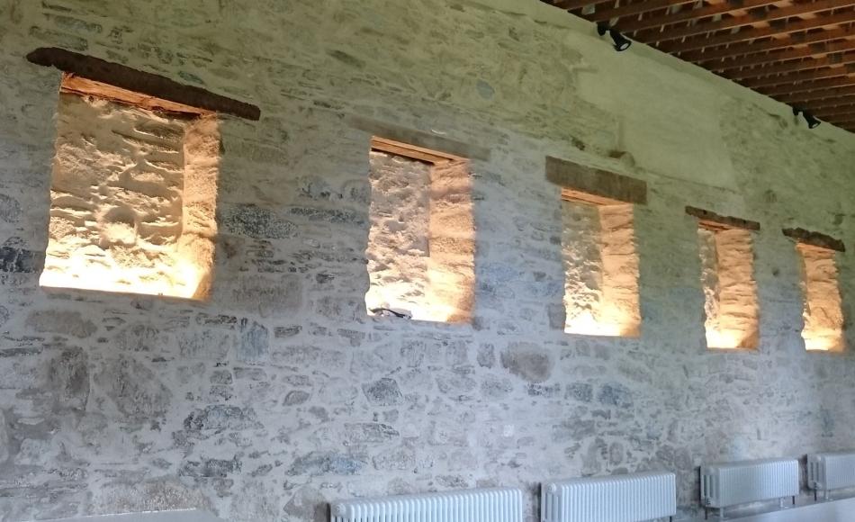 Retention and illumination of existing features such as recesses, stonework and roof structure.