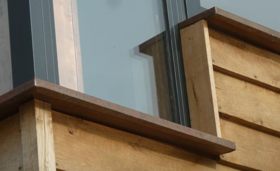 Detail of copper sills to horizontal timber clad walls