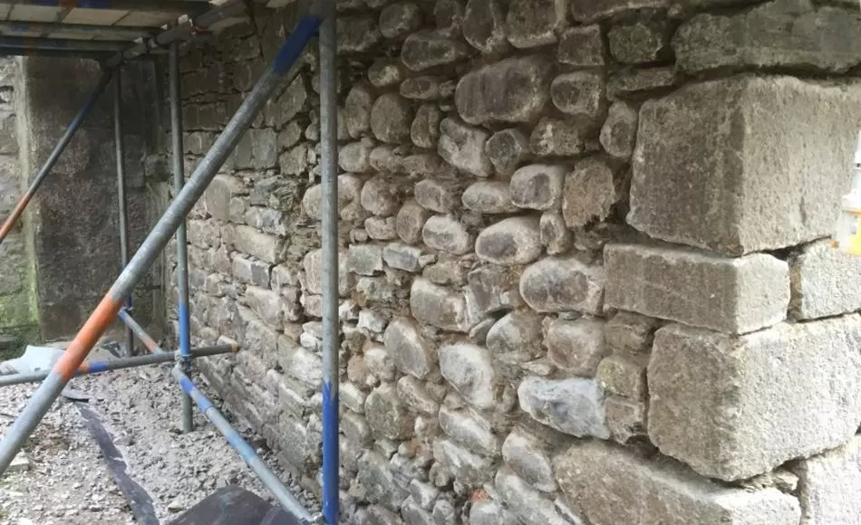 Removal of cement exposing stonework
