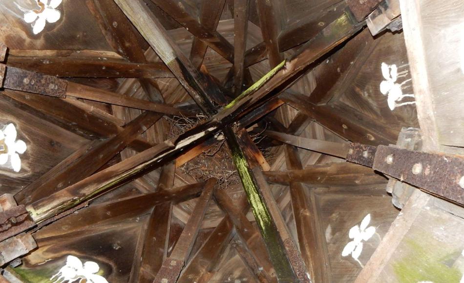 Before repair: water penetration into the spire had caused extensive concealed decay of the structure and corroding of fixings.