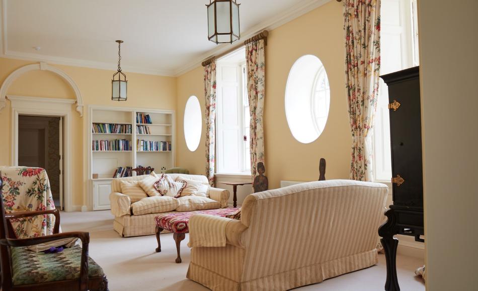 The previously dark corridor is now an airy space overlooking the parkland