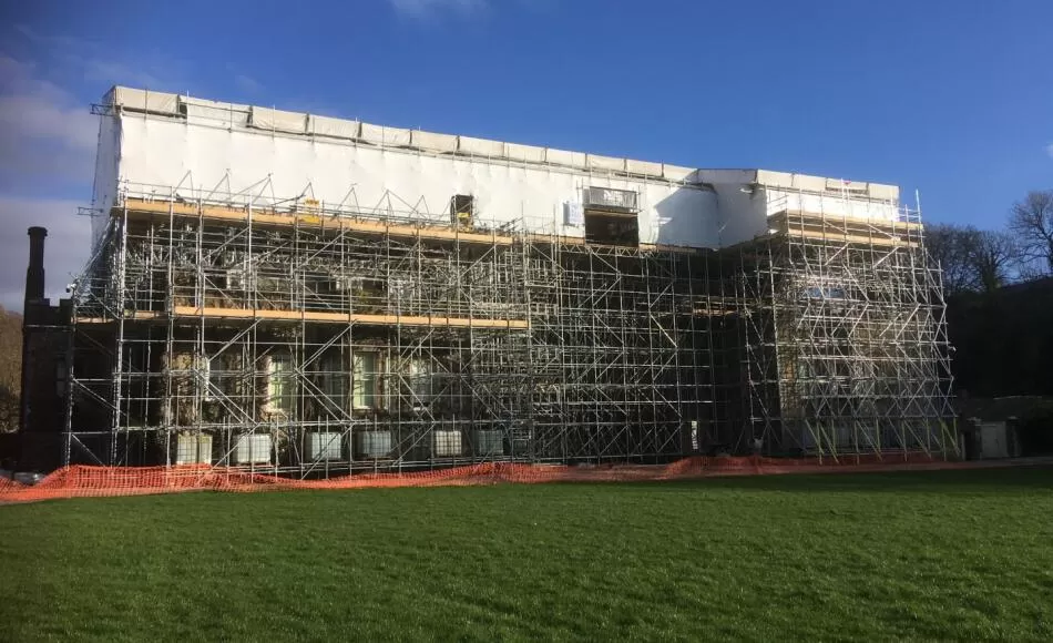 Hartland Abbey completely encased in scaffolding