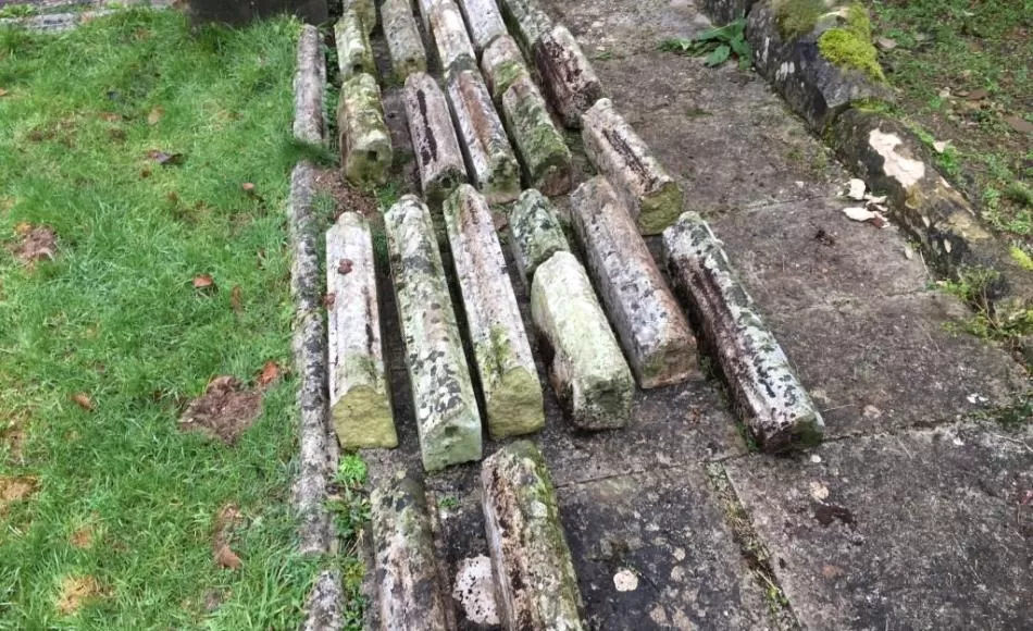 Sorting carved stone edgings for storage