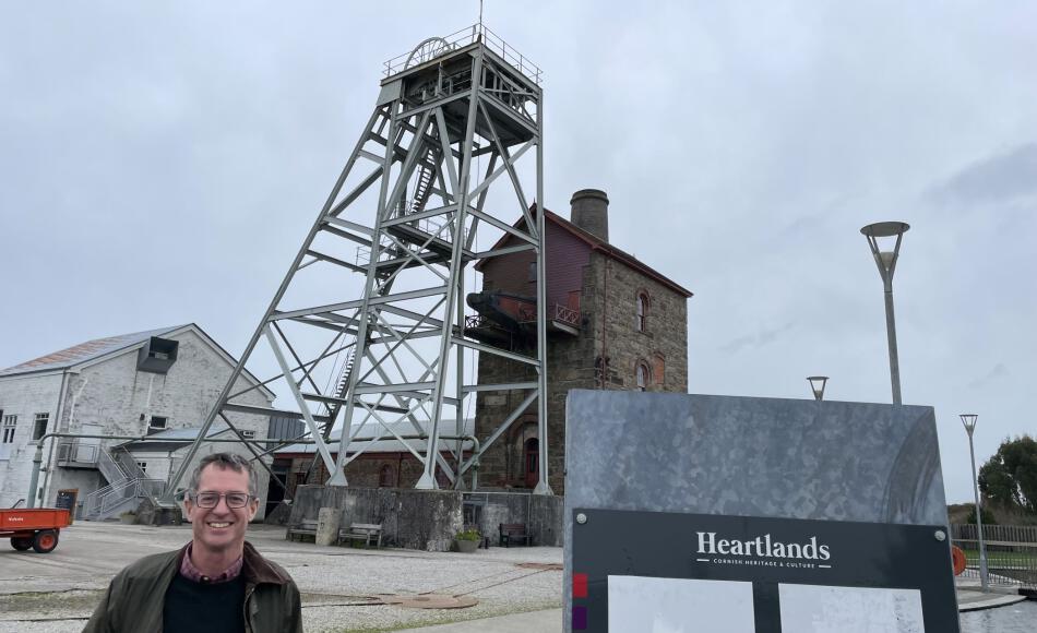 John with the restored steel head frame behind