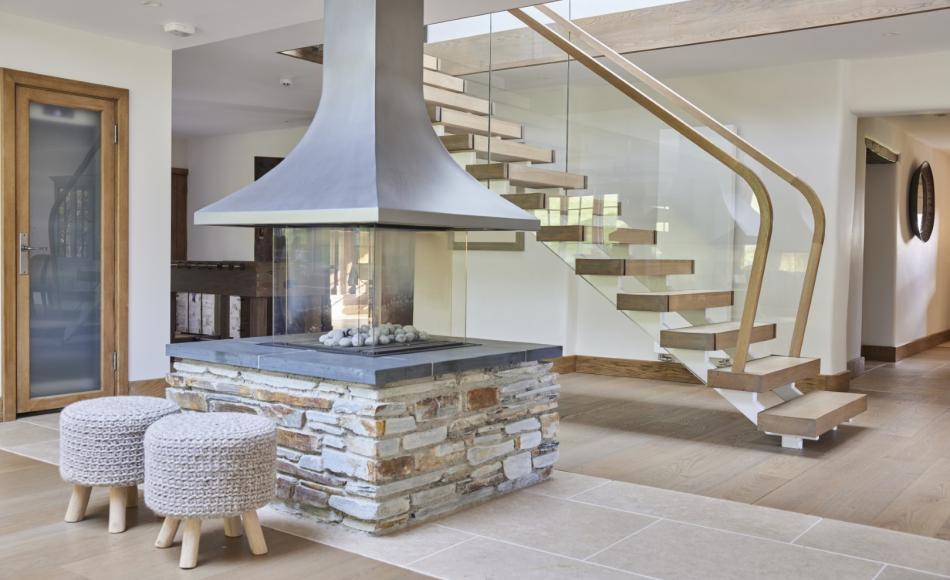 Feature fireplace and floating staircase