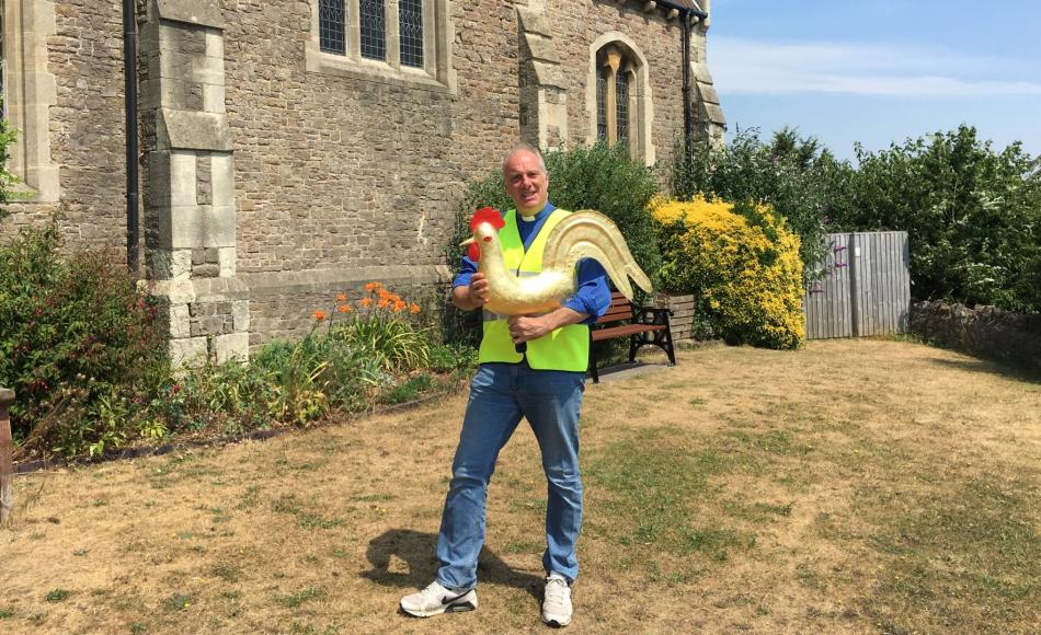 Reverend Webber with the refurbished cockerel weathervane