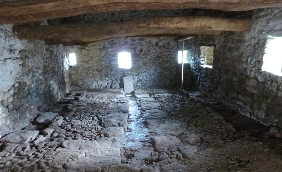 13th century shippon with sandstone and granite slate and cobbles. An upland long house.