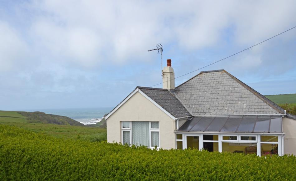 Current bungalow prominent in the AONB and skyline