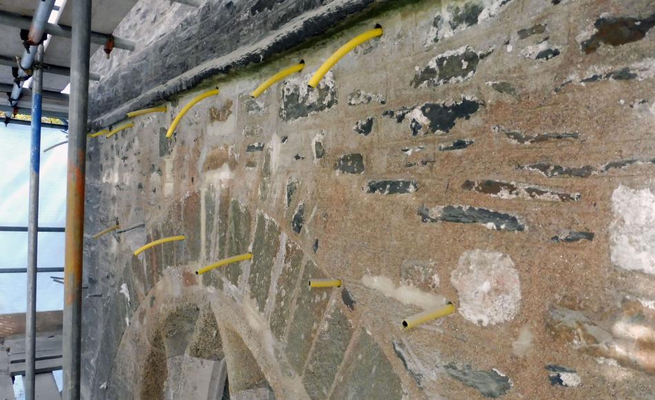 Grouting in process with flush out and mortar insertion holes