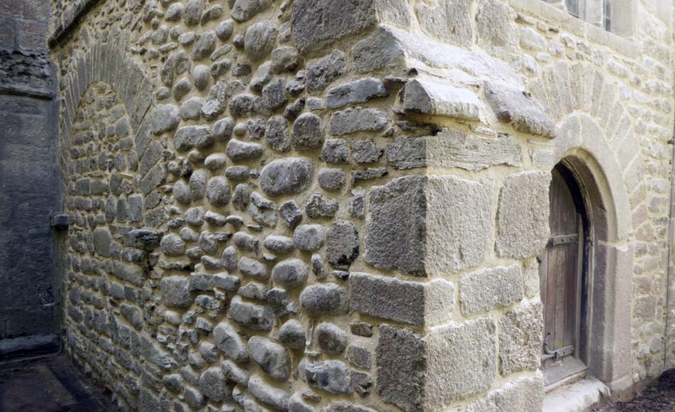 Removal of cement pointing and render to expose character of stonework