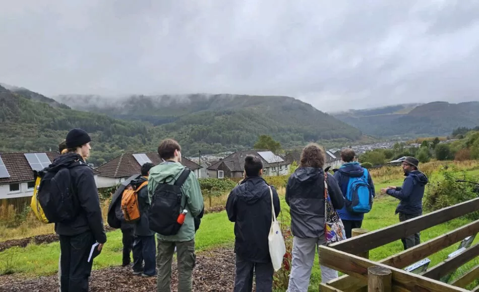 Dominic working with community groups at the orchard in Treherbert