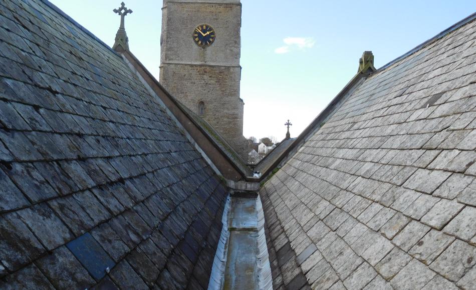 Current defective slated pitches and lead stepped gutter 