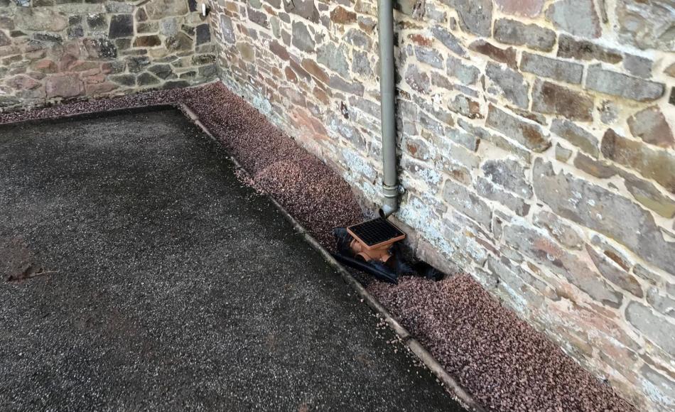 French drains are an effective method of taking rainwater away from the base of the building