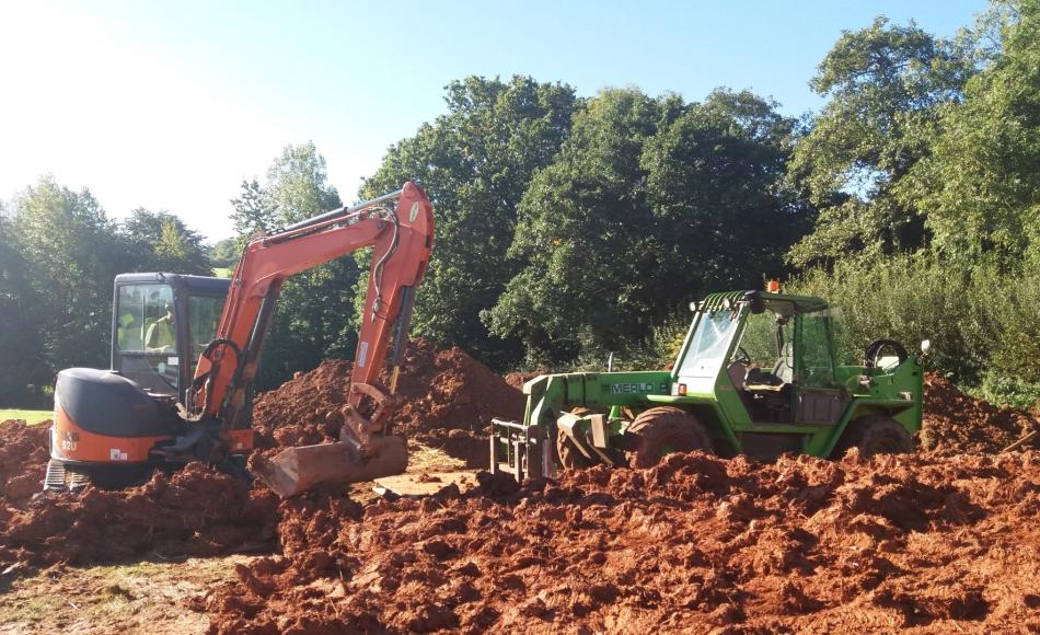 Mixing and loading of cob with a 360 excavator and a Merlo telescopic forklift