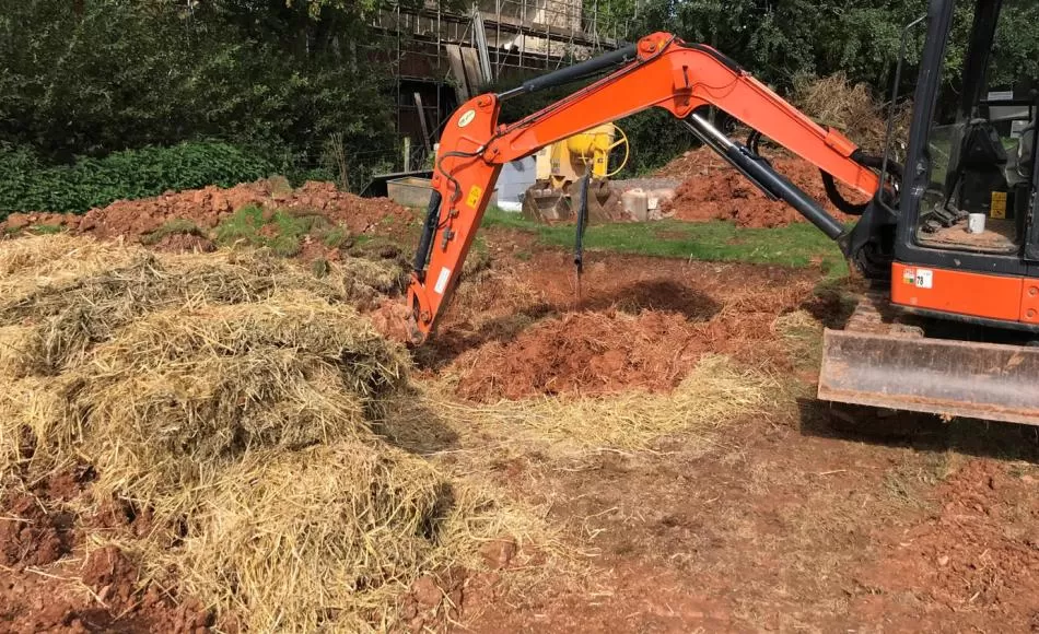 Cob mixing using water and straw