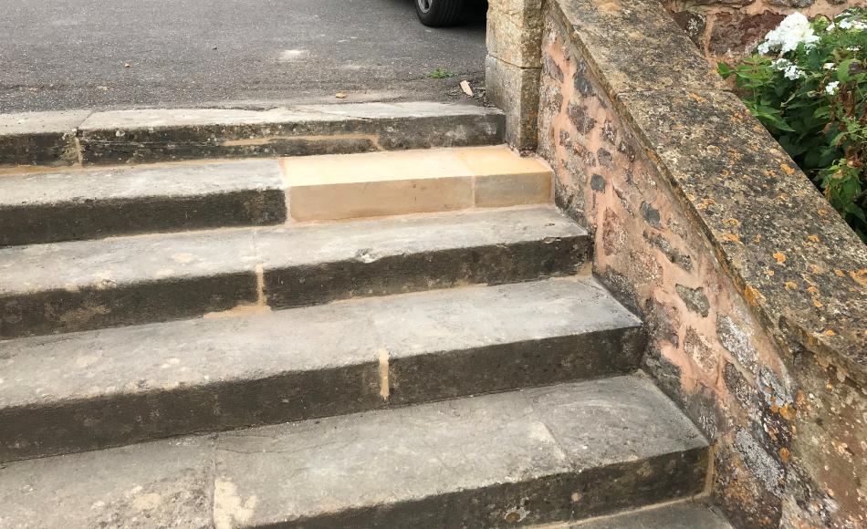 Replacement sandstone step. This will weather to a matching colour in a short time.