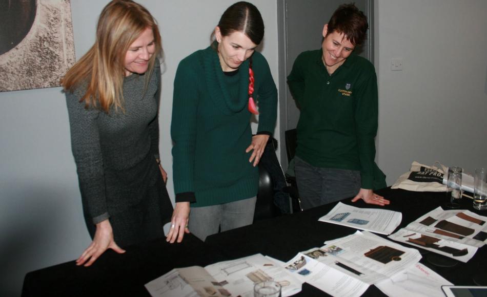 The judges reviewing some of the entries.