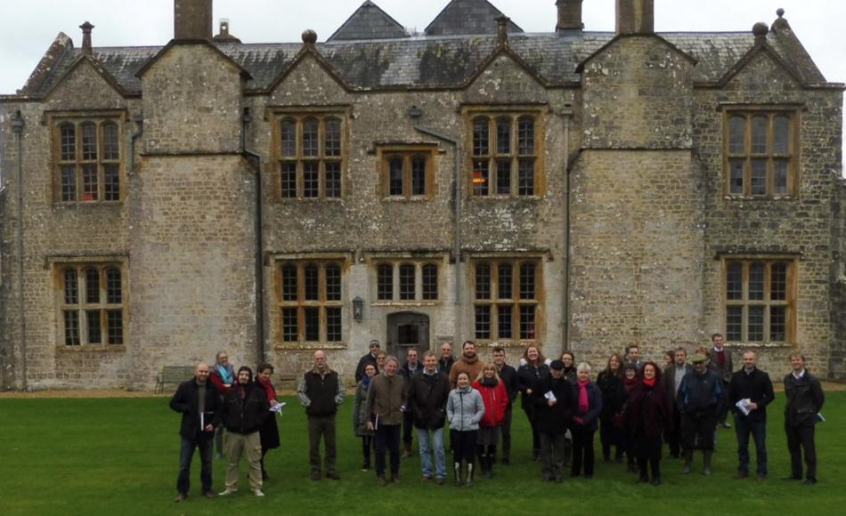 The group assembled outside the manor house.