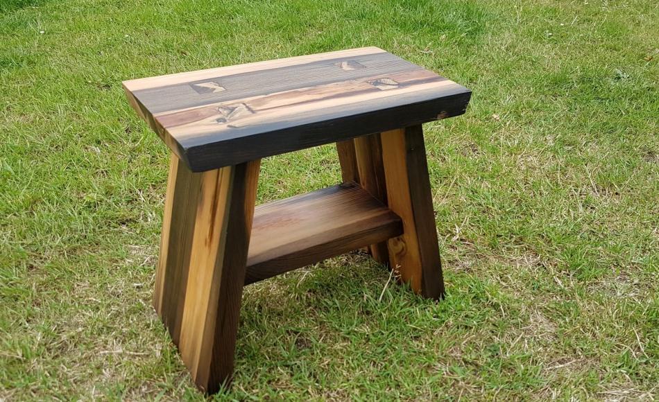 The finished stool in which the grain of the wood, and the beautiful construction are the stars