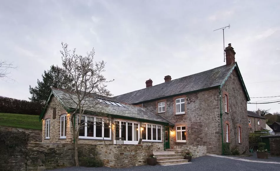 The games room forms a complementary addition to the historic house