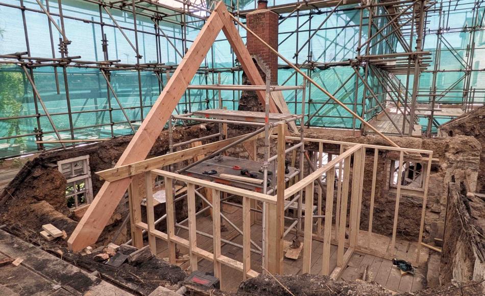 The first of several new trusses being installed at Glebe and Trinity Cottages, Drewsteignton